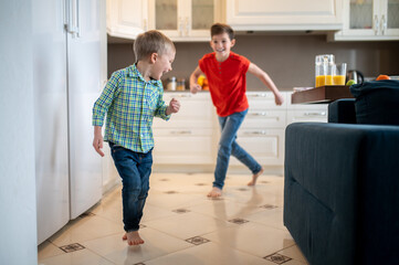 Two cute kids having fun at home