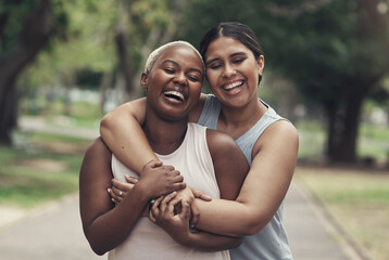 You always make me smile. Shot of two female friends taking a break during their workout.