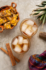 Fototapeta premium Tepache beverage with cinnamon and piloncillo. Mexican drink