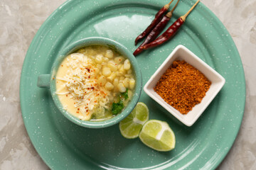Corn esquites with mayonnaise and cheese. Mexican food