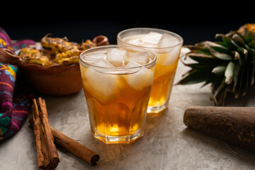 Tepache beverage with cinnamon and piloncillo. Mexican drink