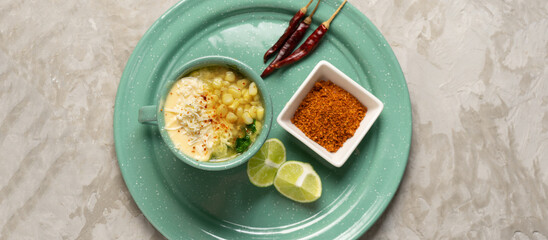 Corn esquites with mayonnaise and cheese. Mexican food