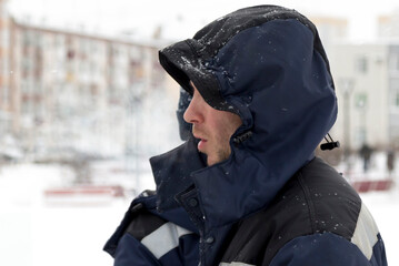 Portrait of a fitter in profile at a construction site