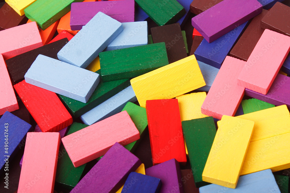 Wall mural  Disorganized colorful wooden blocks. 