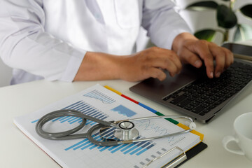 Healthcare and Medical doctor analyzing medical report Medical technology concept..