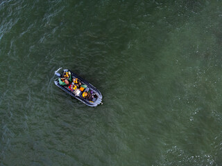 Inflatable boat floating on sea water