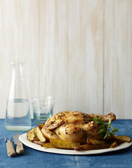 Roast Chicken Greek Potato on Blue Table