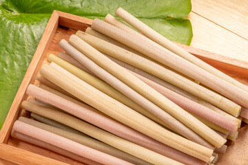 Fresh Lotus stem on lotus leaf, Lotus stem variety of Asian food ingredients.