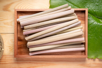 Fresh Lotus stem on lotus leaf, Lotus stem variety of Asian food ingredients.