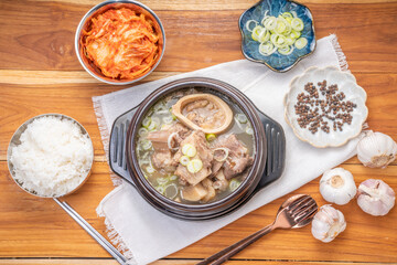 Beef bone soup or Seolleongtang The Most COMFORTING Korean food Served with kimchi, steamed rice, a popular Korean dish.