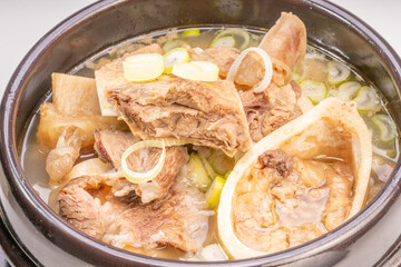 Beef bone soup or Seolleongtang The Most COMFORTING Korean food Served with kimchi, steamed rice, a popular Korean dish.