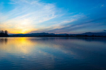 Sunset over the lake from a lot of Rain