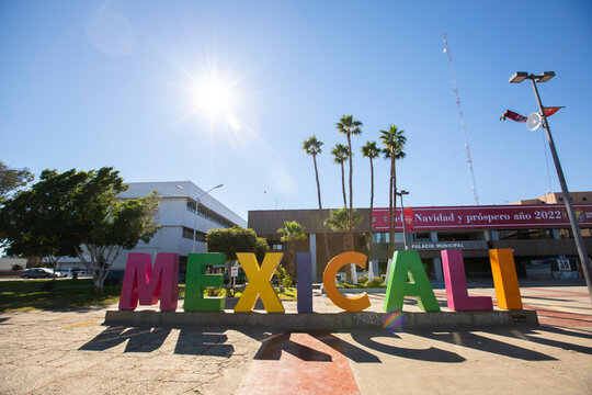 Mexicali, Baja California, Mexico - January 2, 2021: Sun shines on downtown Mexicali sign.