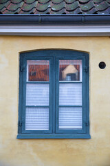 Fototapeta na wymiar House window in an old village houses in Denmark
