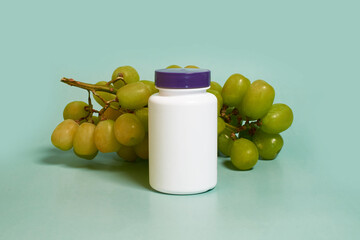 Mock up. A white plastic jar with a purple lid and grapes