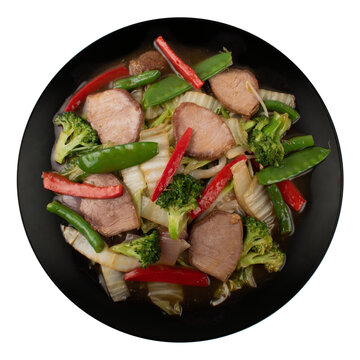 Pork with vegetables, bell pepper, broccoli, bean sprouts, in salty sauce. chinese food dish on white background Chifa, Peruvian food. Photo above.