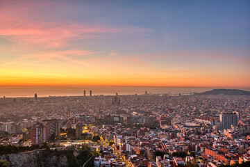 Beautiful sunrise in Barcelona seen from a viewpoint in the hills