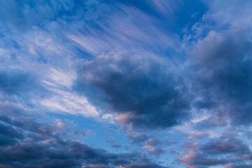 Fototapeta na wymiar Amazing sunset cumulus and cirrus cloud on blue sky. Nature, climate background