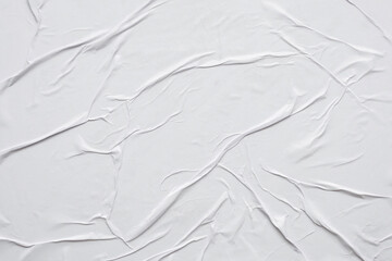 Blank white crumpled and creased paper poster texture background
