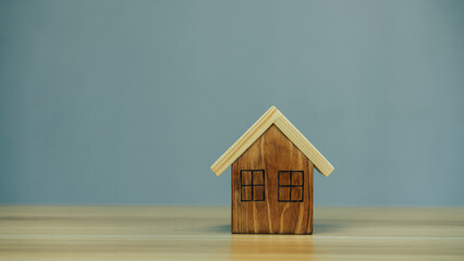 Obraz na płótnie Canvas House wood model on table background, Planning to buy property.
