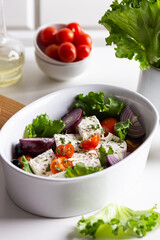 Baked feta cheese with vegetables