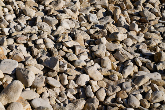 brown beige rock pebbles stone for background Beach water arid
