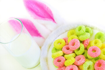 Bowl of colorful fruit loops . Multigrain cereals in a form of rings, close-up, food background