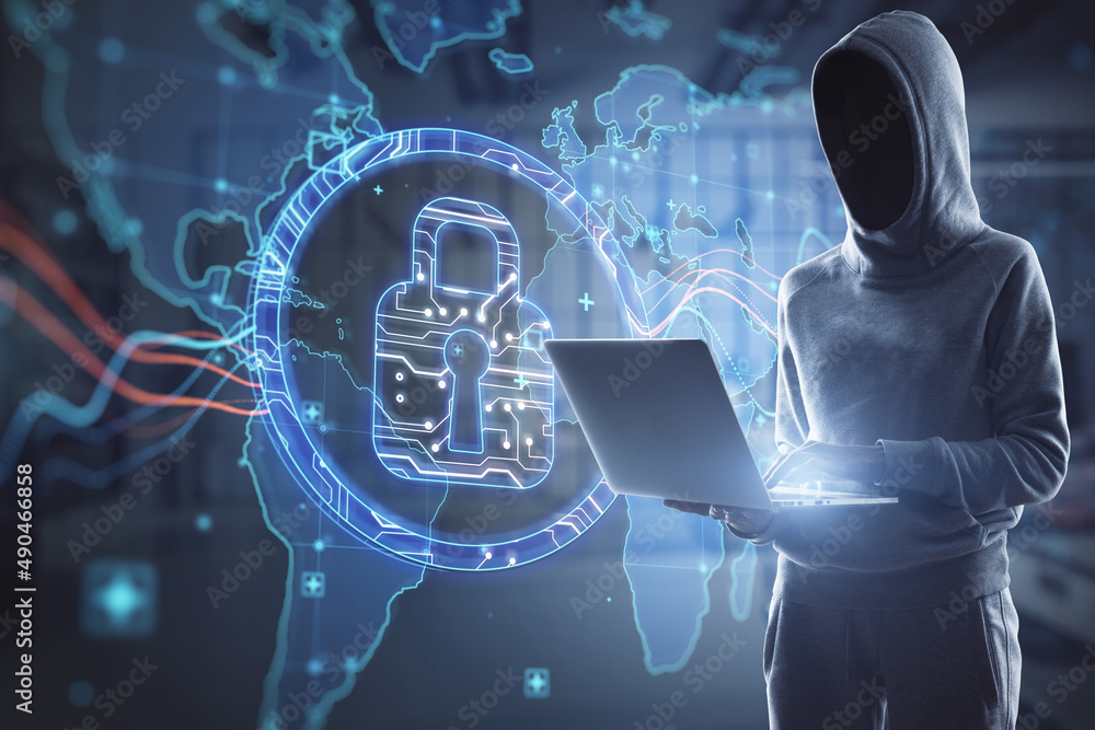 Poster hacker in hoodie using laptop with abstract digital padlock and map hologram on blurry office interi