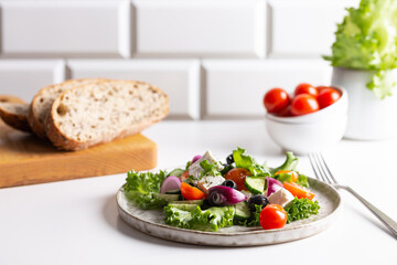 Greek salad with feta cheese and red onion