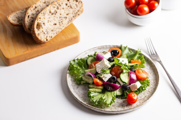 Greek salad with feta cheese and red onion