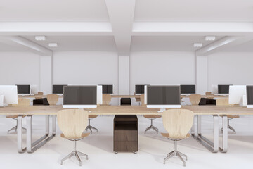 Contemporary concrete and wooden coworking office interior with equipment, furniture and computer monitors. Design and workplace concept. 3D Rendering.
