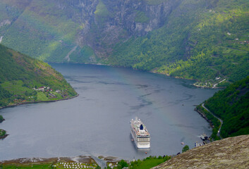 Norwegian cruiseship or cruise ship liner Star in Geirangerfjord during cruising to Norway in...