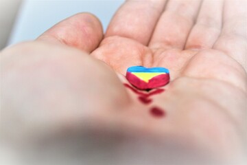 
bleeding blue-yellow heart