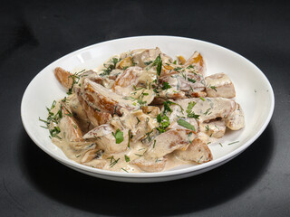 Chicken with potato in cream sauce