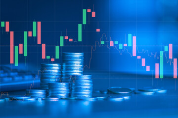 Stack of money coin with trading graph, financial investment concept use for background