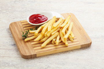 French fried potato over board