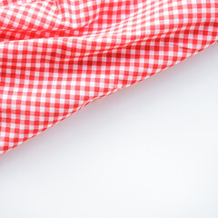 crumple pink plaid fabric or classic tablecloth on white background with copy space