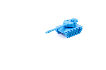 Toy tank of blue color. Close-up of little plastic ABS model. Blue filament. Objects printed by 3d printer Isolated on white background.
