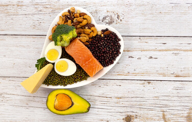 Healthy food with Healthy low carbs products. Ketogenic diet concept on wooden background