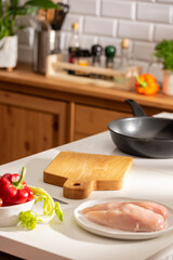 Cooking dinner with teriyaki chicken on the kitchen