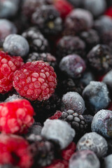 frozen raspberries, blackberries and blueberries close up