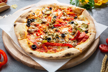Close up of italian pizza with pepper olive and cheese take away food