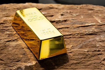 Gold bars on the rocky ground