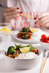 Dinner with asian teriyaki chicken with rice