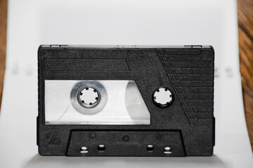 Audio cassette. Retro music medium, compact cassette tape recorder.