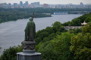 Statue of Volodymyr the Great and view of the left bank of the Dnieper River in peaceful Kyiv,...