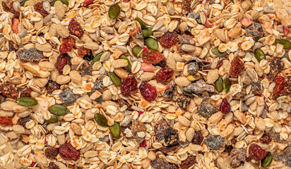 Oat flakes wallpaper with Nuts, seeds and dried fruits. Muesli  Pattern.