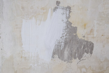 Background texture, wall during renovation, putty painting and whitewashing.