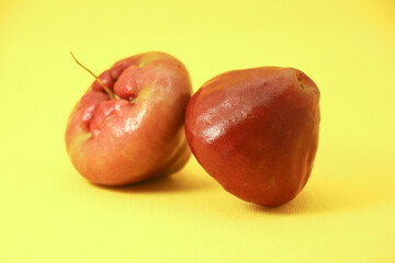 Rose apple fruit flavors of sweet red gloss on the white background