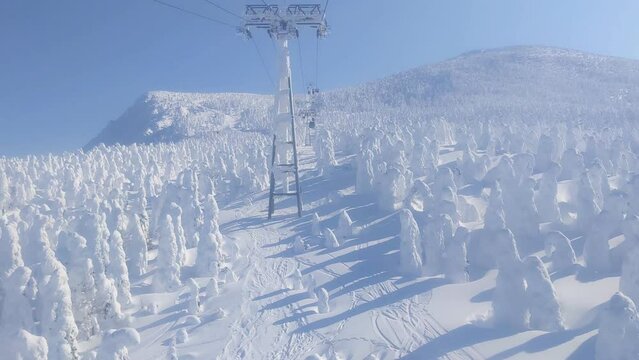 Passing through ice monsters (soft rime) plateau with cable car. (Zao-onsen ski resort, Yamagata, Japan)
